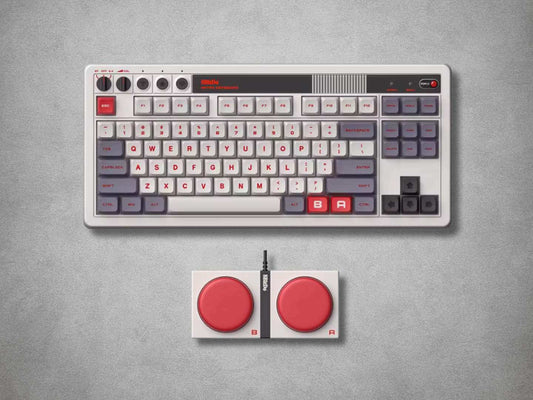 8BitDo Mechanical Keyboard NES with red and grey keys on a grey background