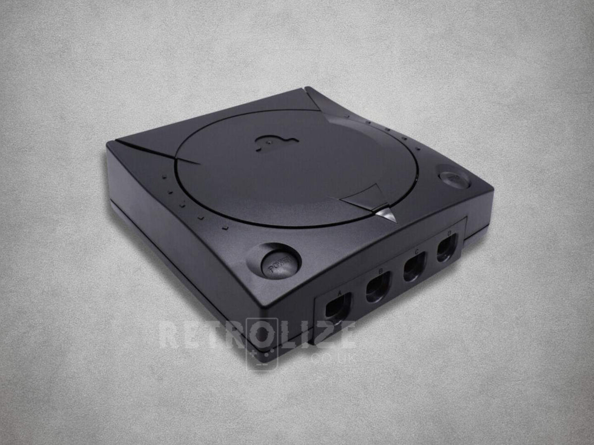 Black Sega Dreamcast ABS replacement shell showing the disc lid, matching buttons and controller port openings