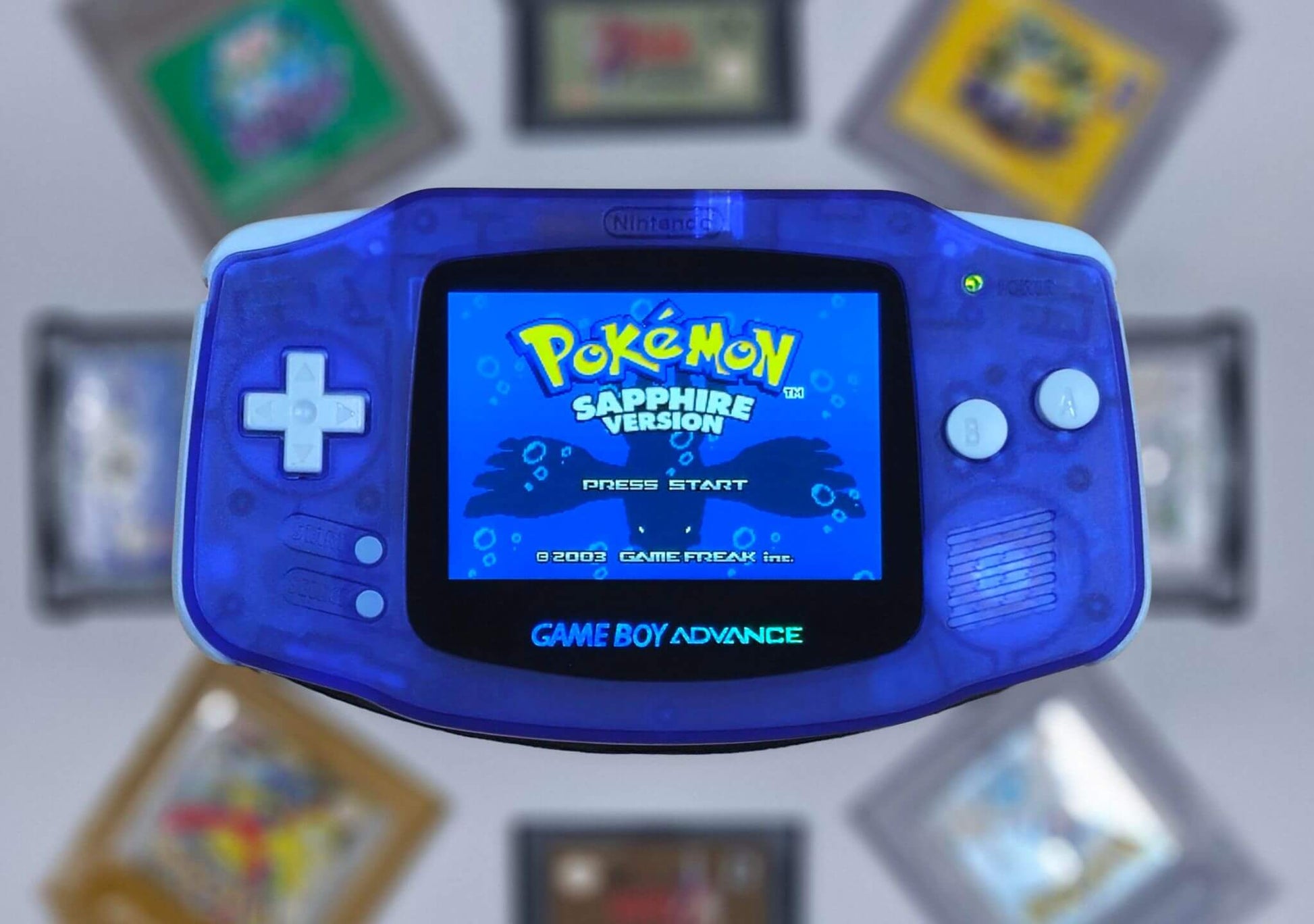 GAME BOY ADVANCE CLEAR BLUE FRONT VIEW WITH SCREEN ON