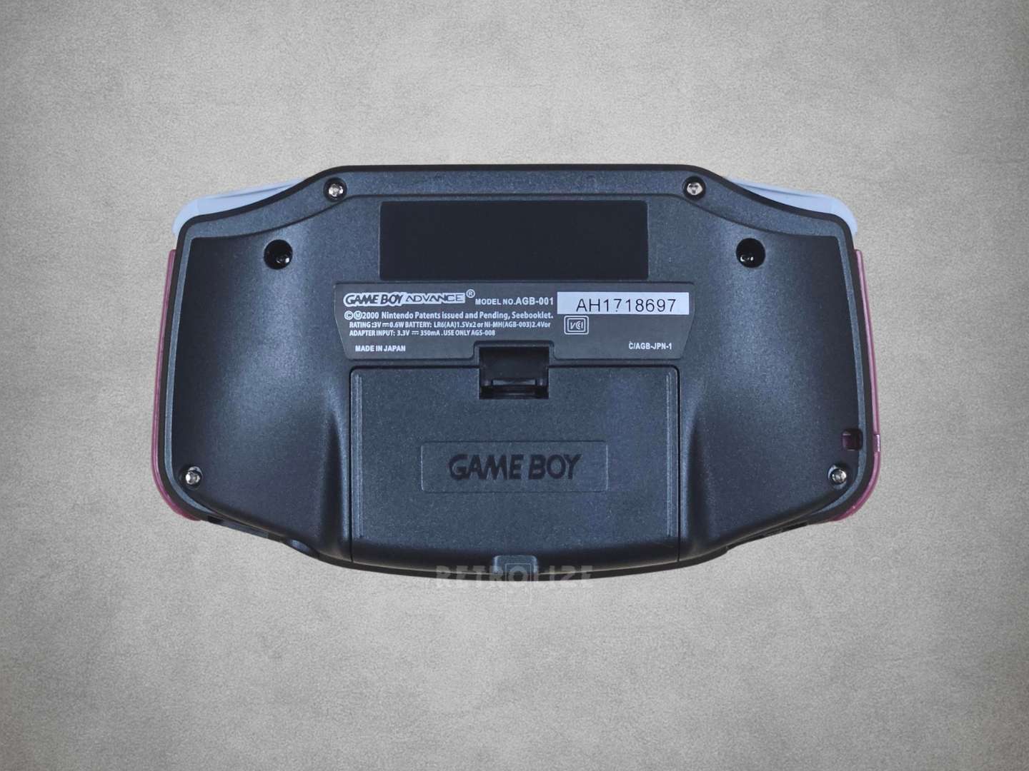 Nintendo Game Boy Advance back view grey background