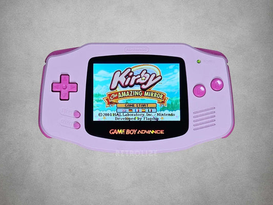 Pink Game Boy Advance with Hot Pink buttons Kirby on screen on a grey background