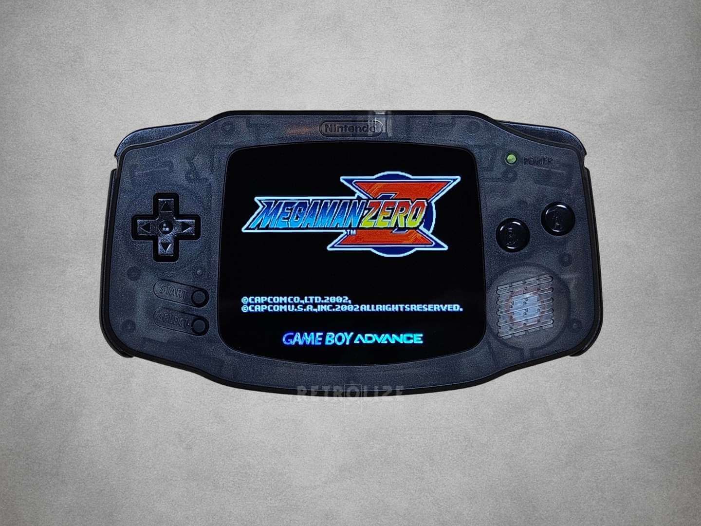 A Smokey Black Game Boy Advance  IPS with Megaman Zero on the screen