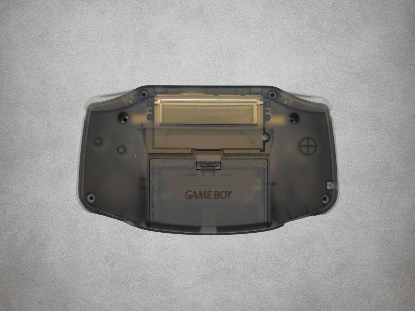 Smokey Black Game Boy Advance shell on grey background back