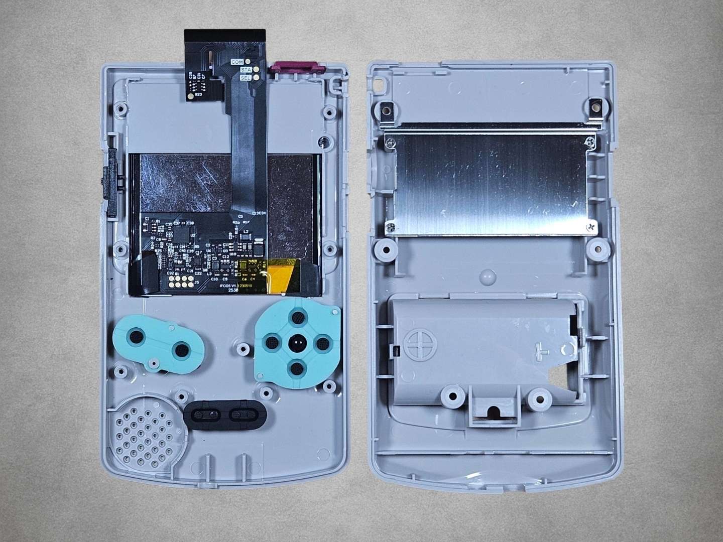 Grey Game Boy Color IPS upgrade kit open view on grey background