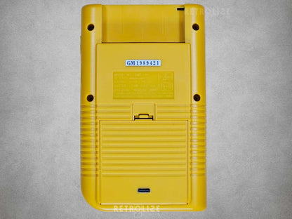 Yellow Game Boy DMG-01 rear view on grey background