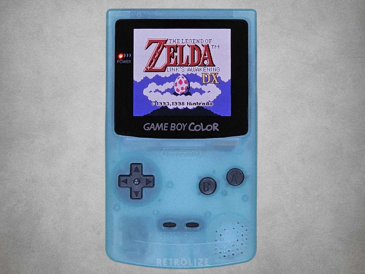 Japan Ice Blue Game Boy Color OLED with Legend of Zelda on screen