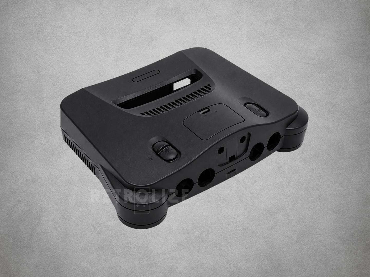 Solid black ABS replacement shell for Nintendo 64, showing the cartridge slot and controller-port openings.