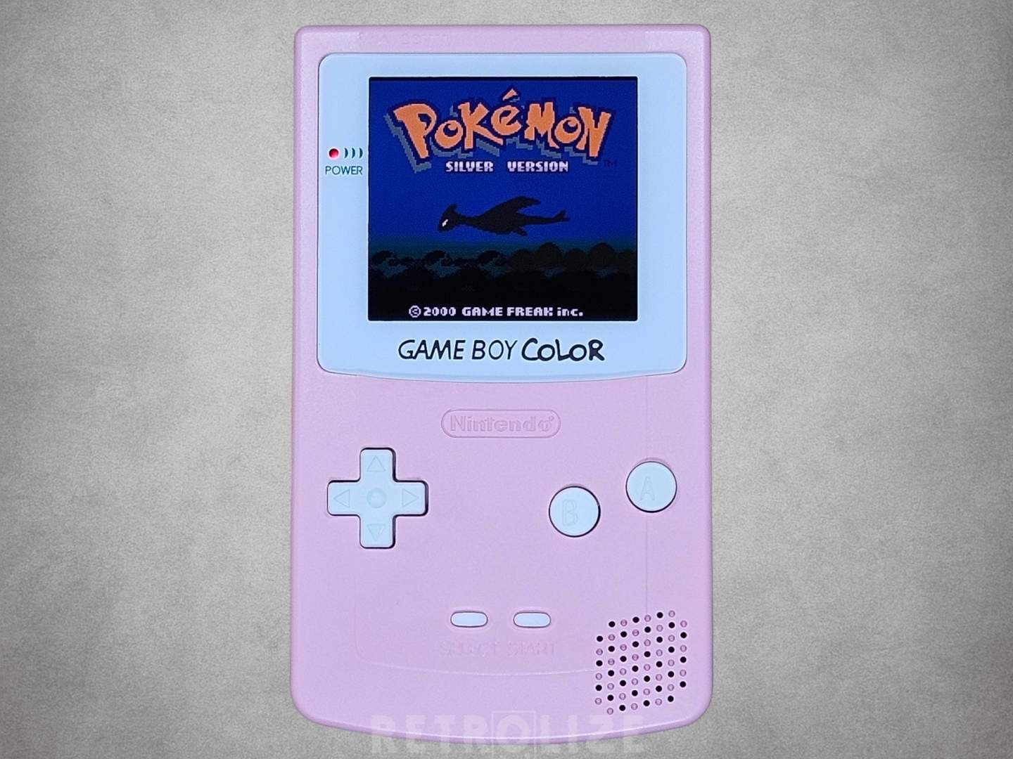 Game Boy Color OLED Pink and White Front View Pokemon Silver on Screen