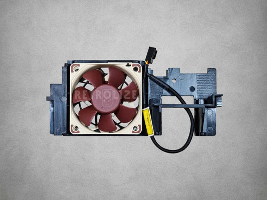 Noctua NF-A6x25 5V fan fitted to a black PlayStation 2 Fat mounting bracket with stabiliser lead
