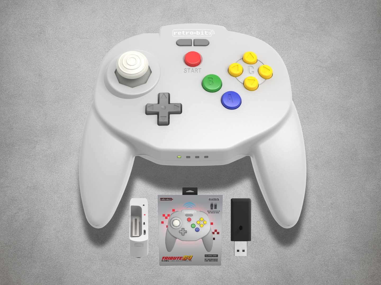 Tribute64 Hori Style wireless Nintendo 64 controller on a grey background
