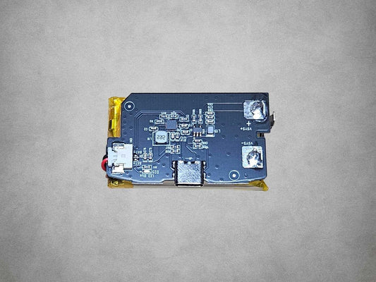 Highspeedido Game Boy Advance battery module showing the USB-C port, circuit board, battery connector and positive and negative contacts.